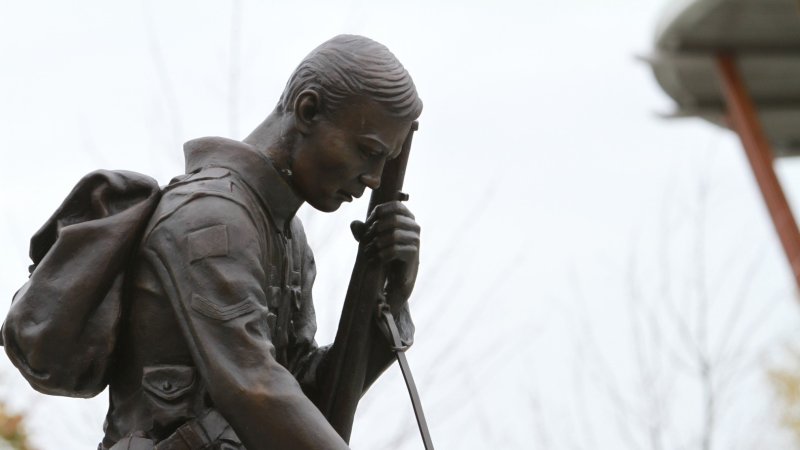 Statue of a soldier sitting