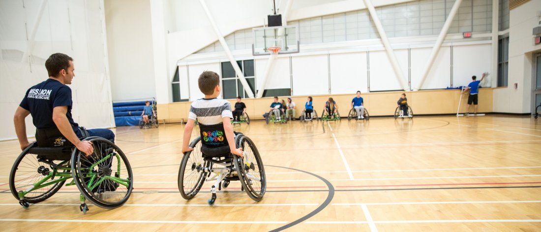 A child on a mobility device