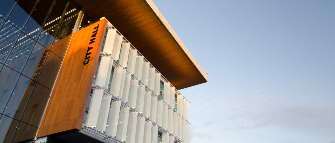 Surrey City Hall from plaza entrance at sunset